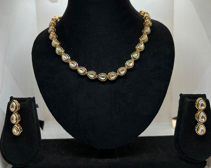 Radiance Reign Kundan Necklace and Earrings Set